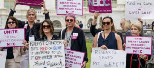 Women on Capitol Hill demanding Congress protect research funding